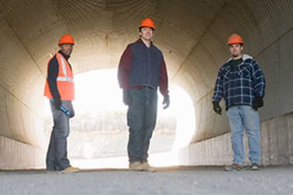 Three construction workers